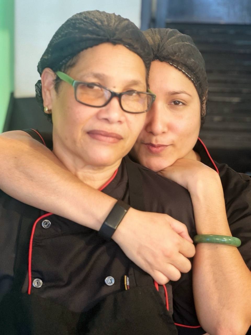 Lola and her daughter at Lola's Food Company